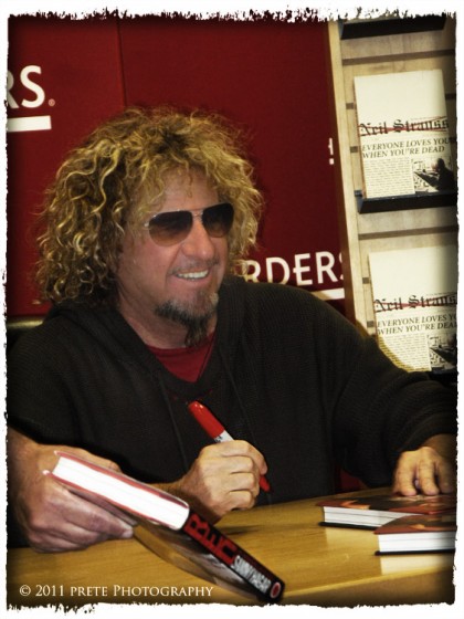 Sammy signing copies of his book for the attendees