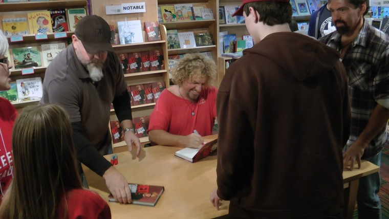 Sammy signing for my kids.