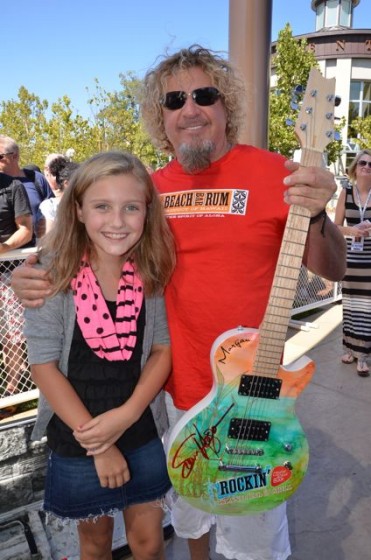 Young Red Head Gets Her Guitar Signed In Roseville, CA